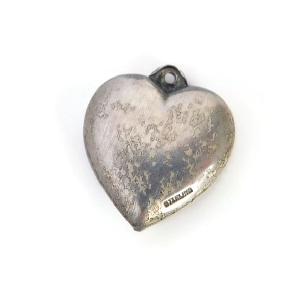 back of 1940s heart charm