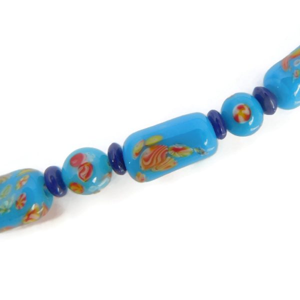 up close shot of blue tombo bead necklace
