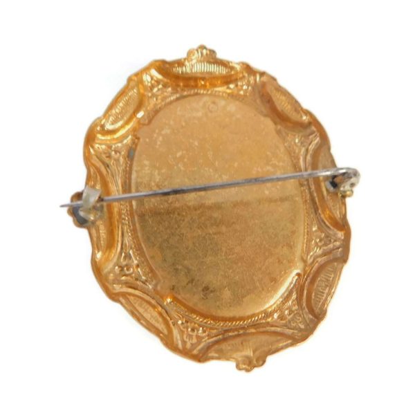 back of porcelain brooch