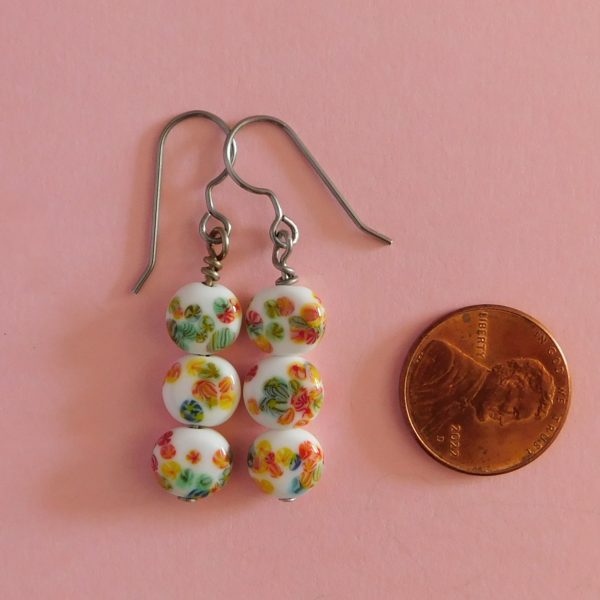 White Japanese Millefiori Earrings with penny for scale