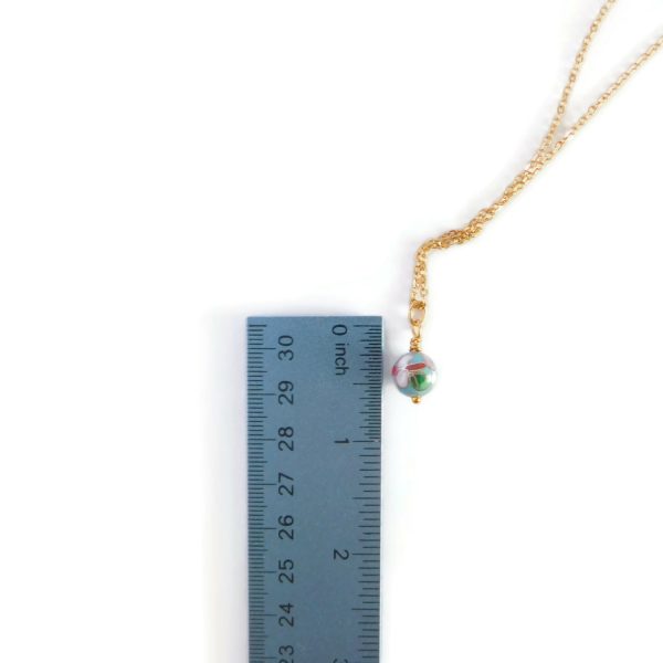 blue cloisonne pendant with ruler for scale