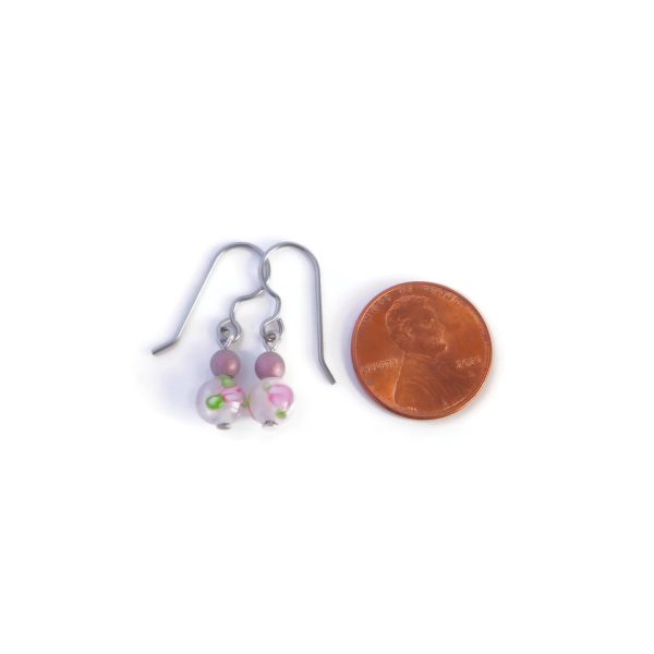 mini purple earrings with penny for scale