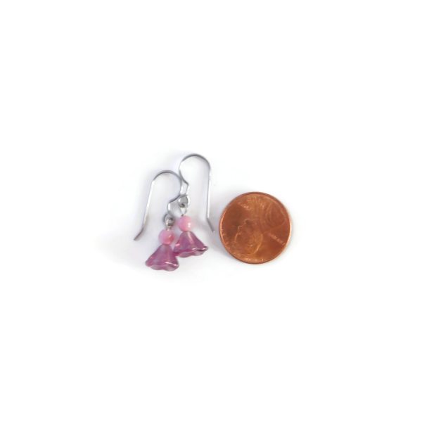 purple and pink flower earrings with penny for scale