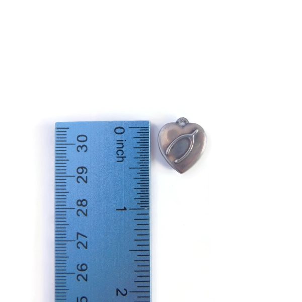 sterling heart charm with ruler for scale