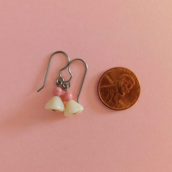 mini czech cream flower earrings with penny for scale