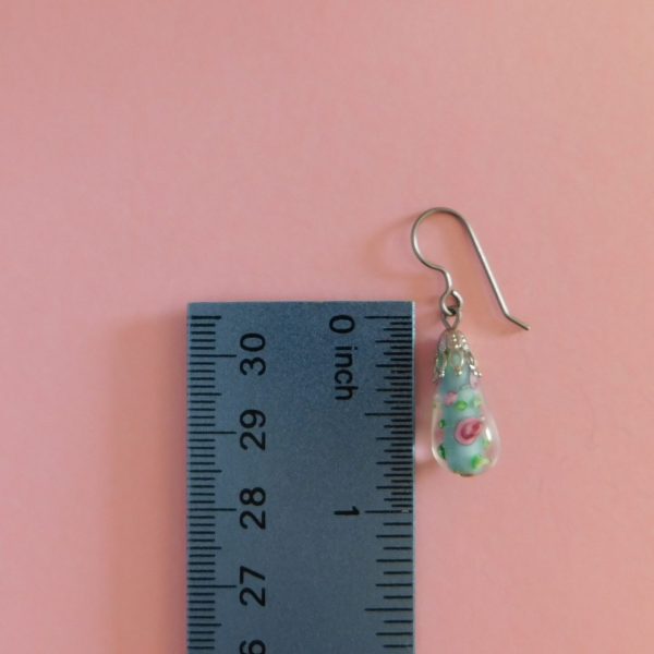 Hand-Painted Floral Teardrop Earrings with ruler for scale