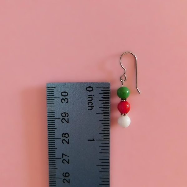 christmas earrings with ruler for scale