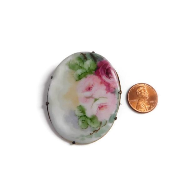 Vintage Porcelain Brooch with penny for scale