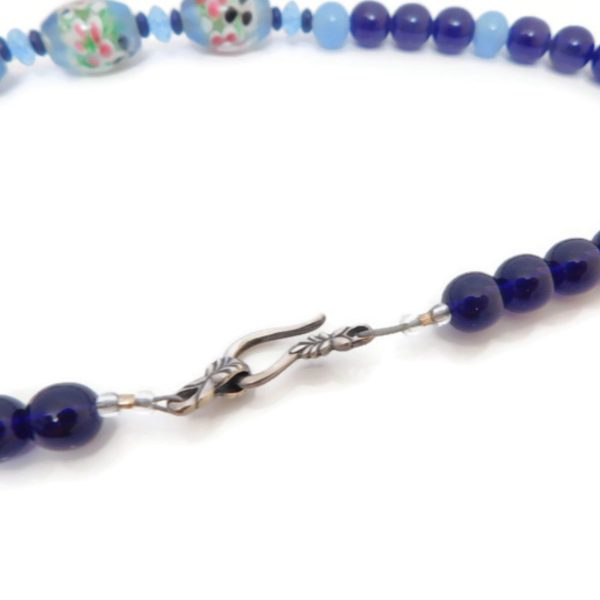 clasp of blue floral necklace