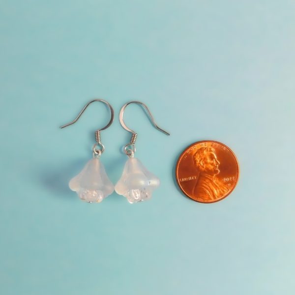 clear flower earrings with penny for scale