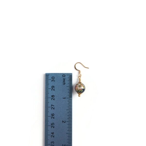 blue tensha bead earrings with ruler for scale
