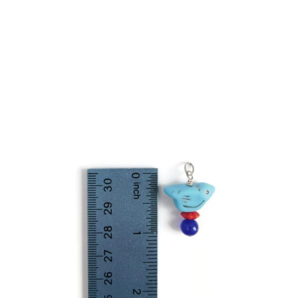 bluebird pendant with ruler for scale