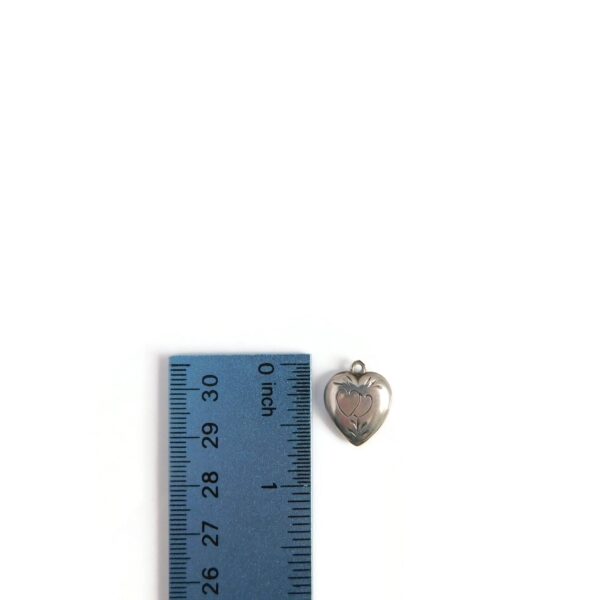 etched puffy heart charm with ruler for scale