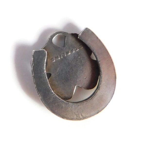 back of good luck charm