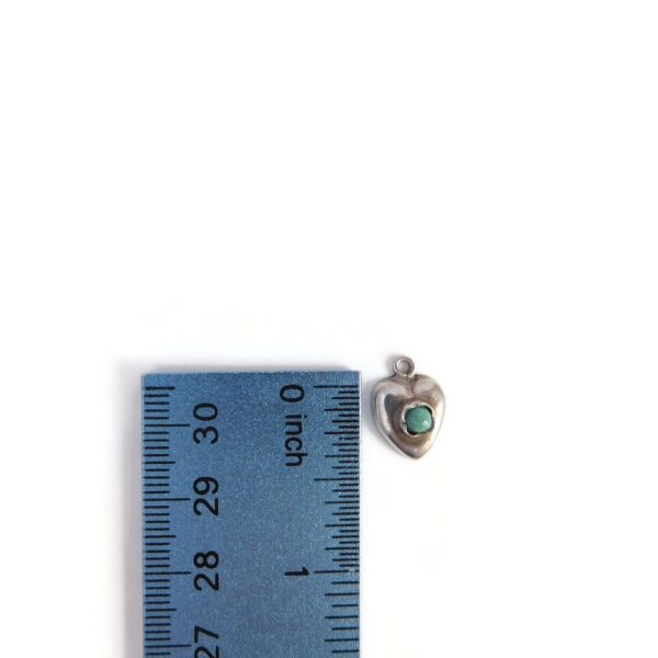 heart charm with stone with ruler for scale