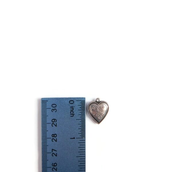 heart flower charm with ruler for scale