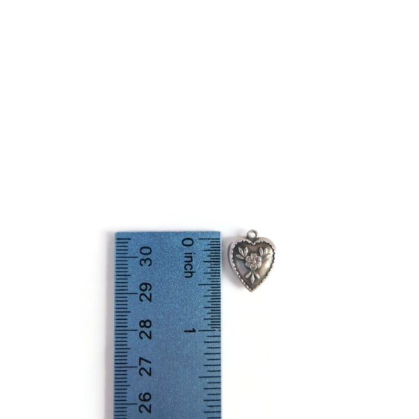 heart flower charm with ruler for scale