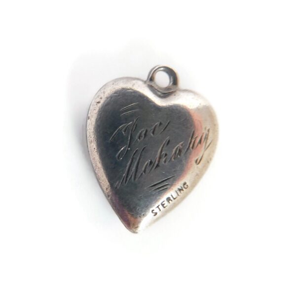 back of heart with flag charm