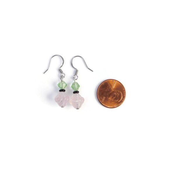 pink drop earrings with penny for scale