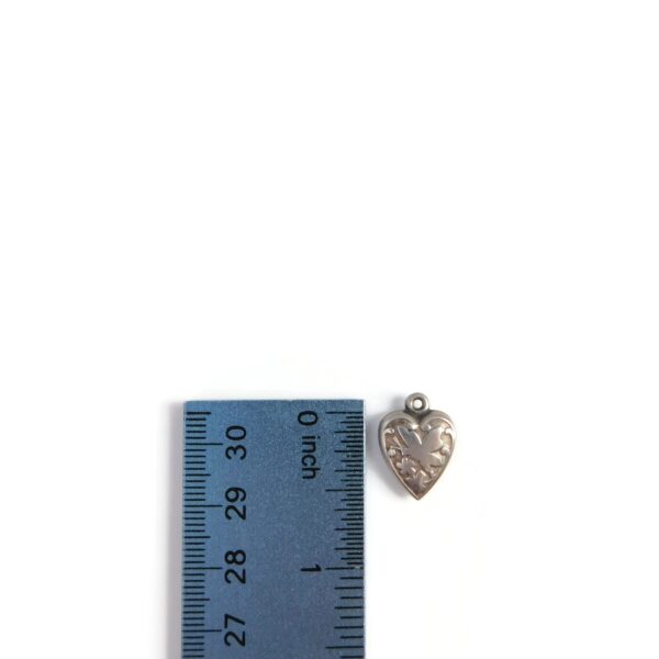 puffy heart charm with ruler for scale