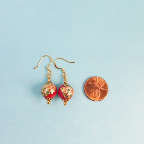red tensha bead earrings with penny for scale