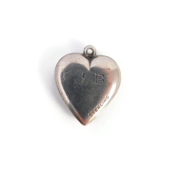 back of silver heart charm