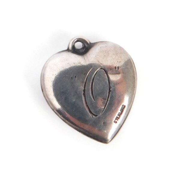 back of vintage heart charm