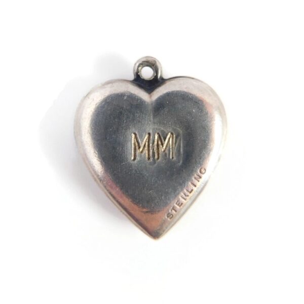 back of vintage heart charm